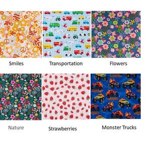 May include: A collection of fabric swatches with various patterns. Designs include floral, transportation vehicles, strawberries, and monster trucks. The swatches are labeled with the pattern names: Smiles, Transportation, Flowers, Nature, Strawberries, and Monster Trucks.
