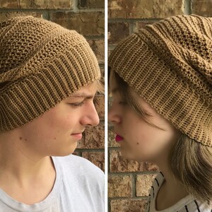 May include: Two people wearing brown crocheted beanies. The beanies have a textured stitch pattern and a slouchy fit.