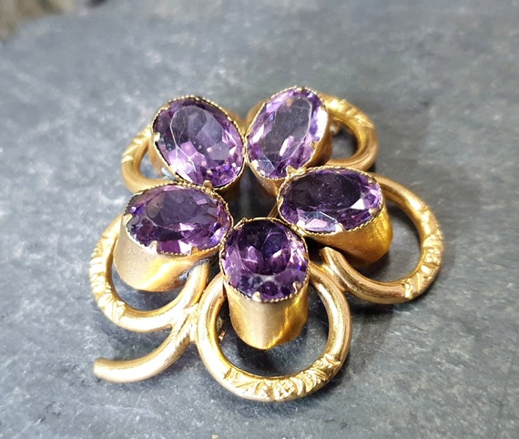 Large purple brooch discount