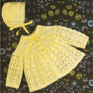 May include: A knitted yellow baby sweater and bonnet set. The sweater has a round collar, long sleeves, and button closures. The bonnet has a ribbon tie. The set is made of a soft, open-weave knit. The text "WOOES OF CHINGFORD" is visible.