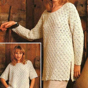 May include: A cream-colored, long-sleeved sweater with a textured, open-weave design. The sweater has a scoop neck and a split hem. A smaller image shows a similar short-sleeved top. The clothing is likely handmade.