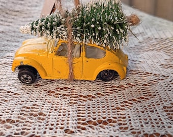 Vintage Toy Car Ornaments with mini trees.