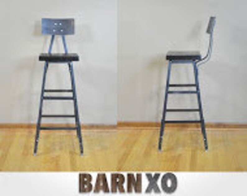 May include: Black metal bar stool with a black wooden seat and a metal back rest. The stool has a simple design with four legs and a footrest.
