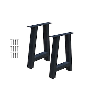 May include: Two black metal A-frame table legs with a slanted design. The legs are made of sturdy metal and are designed to support a tabletop. The legs are shown on a white background.