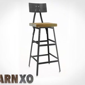 May include: Black metal bar stool with a wooden seat and a backrest. The stool has a simple, industrial design.