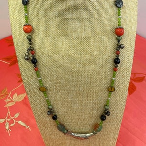 Bohemian style beaded necklace with large silver color fish bead
