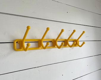 Vintage yellow Jaffa hook rack