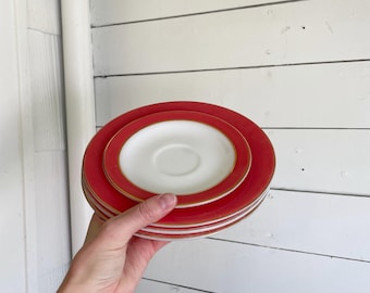 Vintage Pyrex flamingo with gold trim/three salad plates and one saucer
