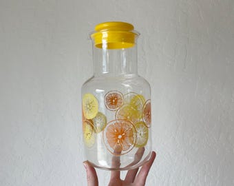 Pyrex orange and lemon juice carafe