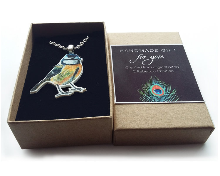 CARTIER. A Gem-Set Bird Pendant. For Sale At