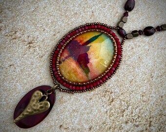 Handcrafted Sunset Pendant Necklace: Impressionistic Art, Beaded Frame