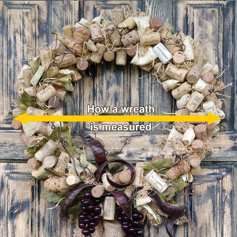 May include: A brown and beige cork wreath with a burlap bow and a cluster of purple grapes. The wreath is decorated with dried leaves and twigs. The text "How a wreath is measured" is written in yellow on a white background.