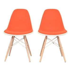 May include: Two orange chairs with white trim and wooden legs. The chairs have a mid-century modern design, with a curved seat and a simple, yet elegant, aesthetic. The legs are made of natural wood and are connected by white metal supports.