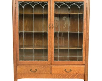 R. J. Horner Style Antique American Empire Carved Tiger Oak Double Bookcase Cabinet With Leaded Glass Doors, Circa 1890s