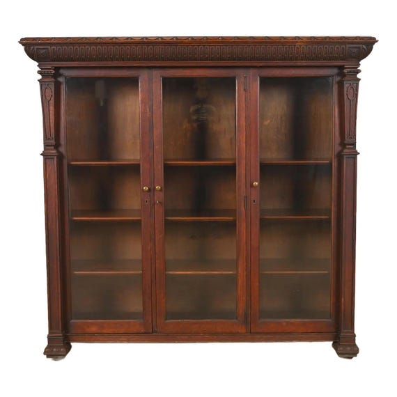 R. J. Horner Style American Empire Carved Oak Glass Front Triple