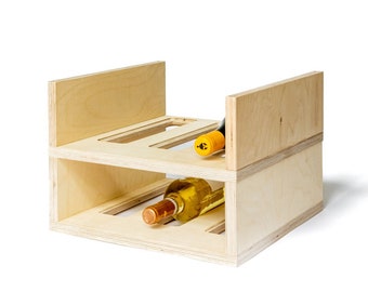 Stackable and modular bottle rack for wine and cava. Organize your bottles with style and versatility, adjust its design to your liking! THE CELLER2