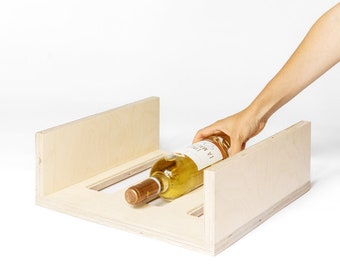 Stackable and modular bottle rack for wine and cava. Organize your bottles with style and versatility, adjust its design to your liking!.EL CELLER1