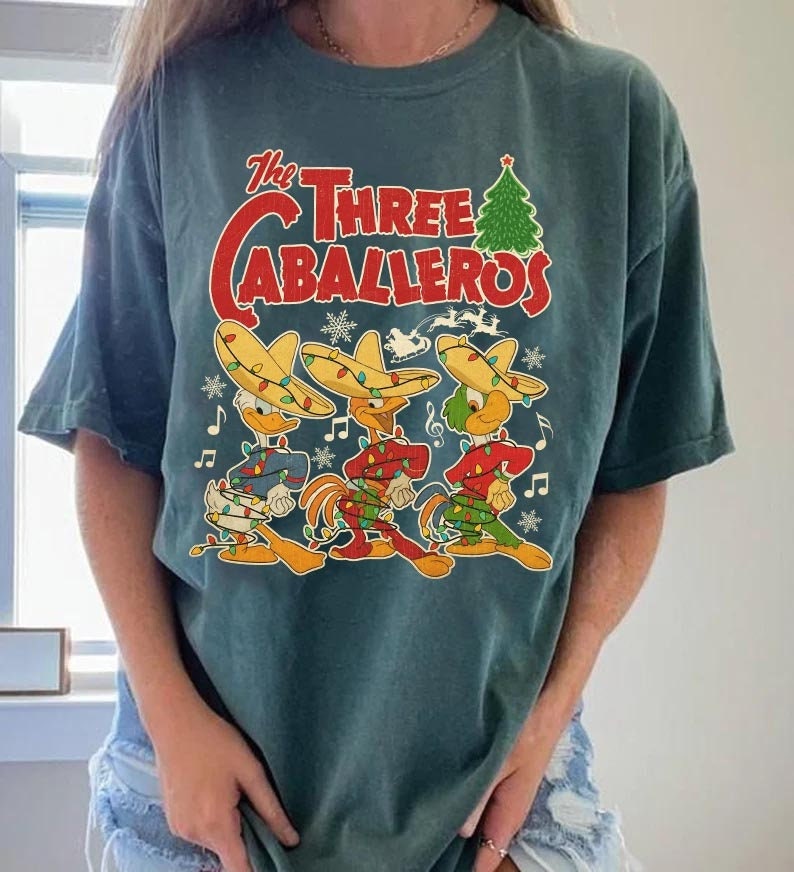 Discover The Three Caballeros Classic Donald Duck Shirt, Duck Jose Carioca Panchito Pistoles Christmas Light Shirt