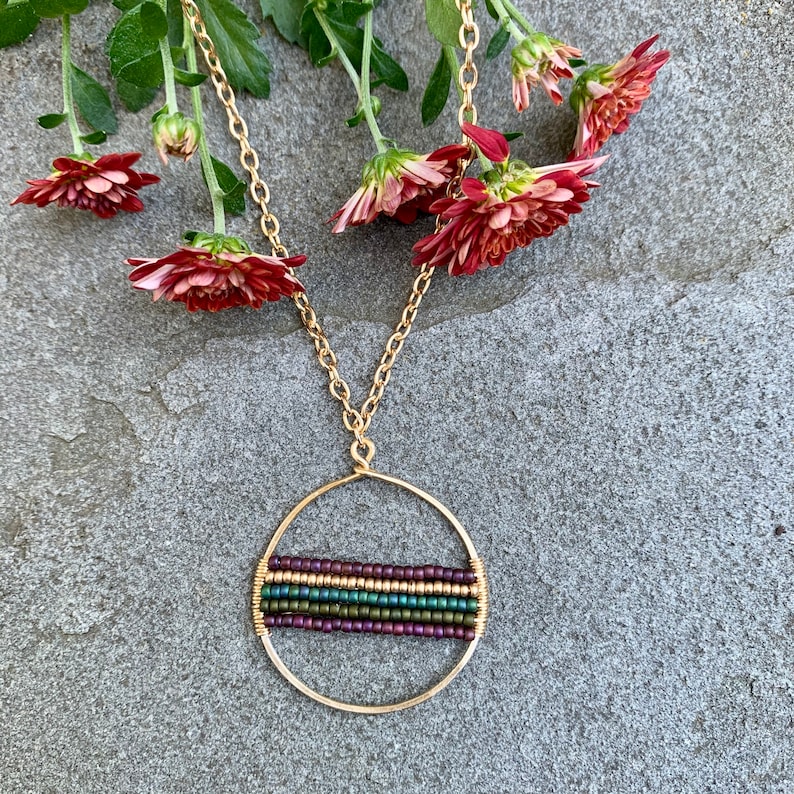 Gold Open Circle Pendant with Ombr\u00e9 Seed Bead Wrap