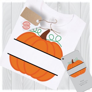 May include: A white t-shirt featuring an orange pumpkin design. The pumpkin is split in half horizontally with a black line. The pumpkin has a brown stem and green vines. The text "iPhone" is visible on a white phone case with a similar pumpkin design.