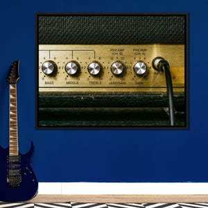 May include: Close-up of a vintage guitar amplifier with knobs labeled "Bass", "Middle", "Treble", "Leadgain", and "Gain". The amplifier has two preamp channels labeled "(CH. B)" and "(CH. A)".