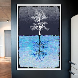 May include: A framed art print featuring a stylized tree design. The upper half shows a white tree against a dark blue background, while the lower half depicts its reflection in blue water. The artwork has a textured, digital art style.