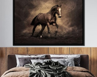 May include: A brown horse with a white star on its forehead runs through a dusty field. The horse is in motion, with its legs outstretched and its mane flowing in the wind. The background is a blurry brown and gold color, creating a sense of speed and movement.