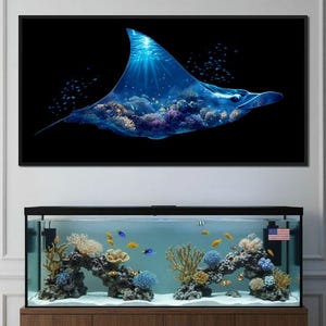 May include: A framed artwork shows a blue manta ray with a coral reef design against a black backdrop. Beneath, an aquarium with colourful fish and coral formations creates a vibrant underwater scene.