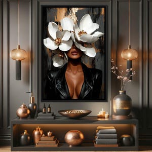 May include: A woman with dark skin is wearing a black leather jacket. Her face is partially obscured by large white flowers. The background is a dark abstract painting with gold accents.