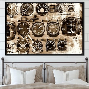 May include: A vintage aircraft cockpit control panel with multiple round gauges and dials. The gauges are in black and white with a distressed, aged look. The panel is made of metal and has a brown, weathered surface.