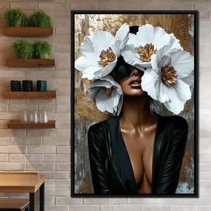 May include: A woman with dark skin is wearing large white flowers over her eyes. She is wearing sunglasses and a black dress. The background is a gold and brown abstract design.