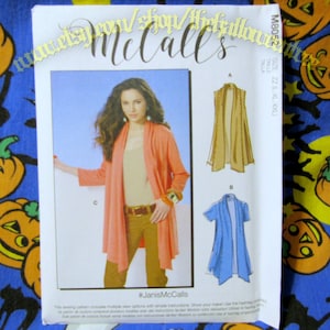 Peut inclure: Un patron de couture pour un cardigan long avec trois options de style différentes. Le patron comprend des instructions et est de chez McCall's. Le numéro du patron est M8055.