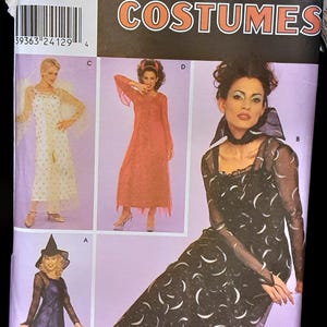 May include: Simplicity Costumes sewing pattern number 309 for sizes 14-20. The pattern includes four costume designs: a witch, an angel, a devil, and a fairy. The witch costume features a black dress with a crescent moon pattern and a black witch's hat. The angel costume features a white dress with a gold trim and a halo. The devil costume features a red dress with a black trim and horns. The fairy costume features a pink dress with a white trim and wings.