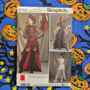 May include: A Simplicity sewing pattern for a Halloween costume. The pattern includes three different costumes: a witch, a steampunk-inspired dress, and a skull-themed outfit. The pattern number is 8719.