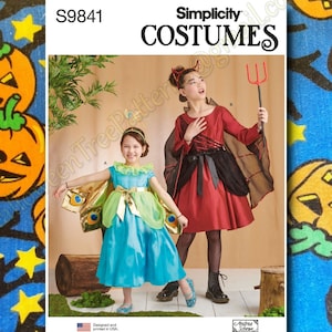 May include: Simplicity Costumes pattern S9841 featuring two children in Halloween costumes. One child is dressed as a peacock in a blue dress with a green and gold cape. The other child is dressed as a devil in a red dress with a black cape.