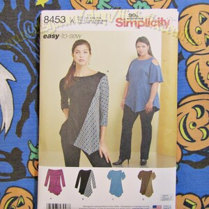May include: Simplicity sewing pattern 8453, featuring a variety of women's tops. The pattern includes designs with asymmetrical details, cold-shoulder sleeves, and a color-blocked design. The text "easy-to-sew" is visible.