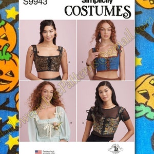 May include: A sewing pattern for four different costume tops. The pattern is called Simplicity Costumes S9943. The tops are all cropped and have a lace-up front. The first top is leopard print, the second is denim, the third is light blue with lace trim, and the fourth is a floral print with a sheer overlay.