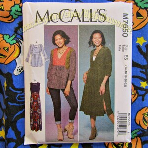 May include: A McCall's sewing pattern package featuring illustrations of women's clothing designs. The package includes a top with a V-neck and jeans, a dress, and a long-sleeved top. The package is labeled with the text "McCall's" and "M7650".