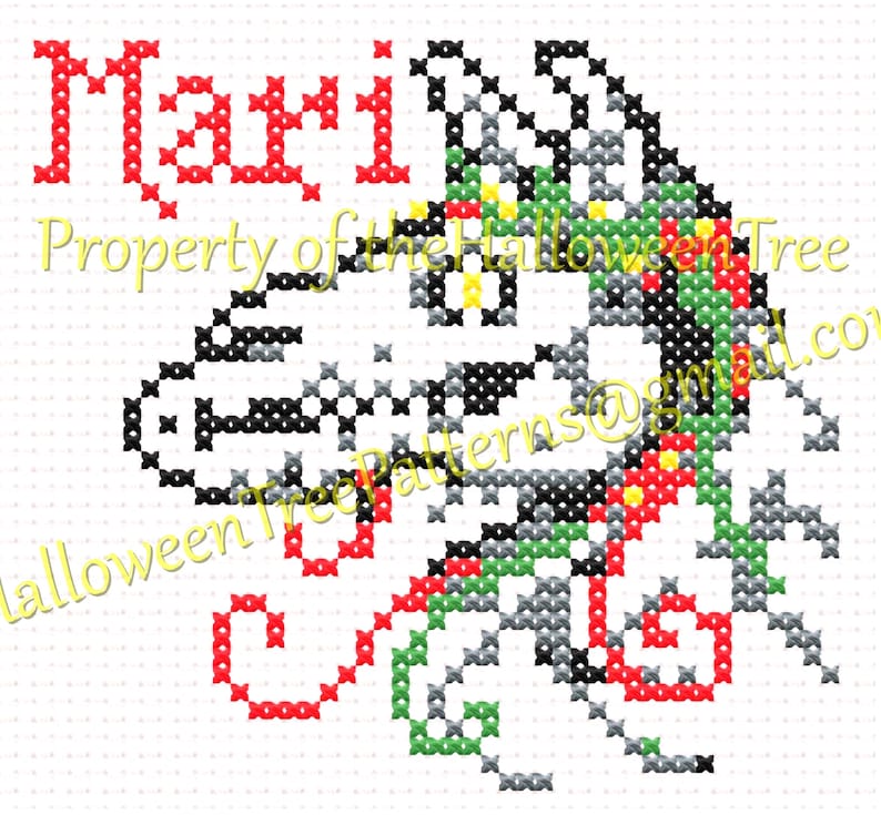 May include: Cross-stitch pattern featuring the word "Mari" in red, with a stylized design in black, gray, green, and red. The text "Property of the Halloween Tree" and an email address are also visible.