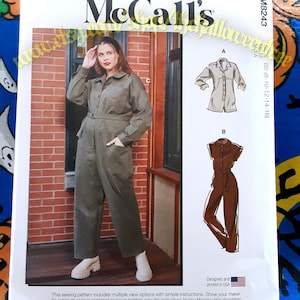 May include: McCall's sewing pattern for a jumpsuit. The pattern includes multiple view options with simple instructions. The image shows a woman wearing a green jumpsuit. The pattern is designed and printed in the USA.