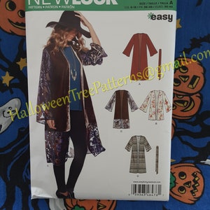 May include: A New Look sewing pattern, number 6476, featuring a woman wearing a long, open-front coat with decorative panels. The pattern includes multiple coat variations and sizing information for US sizes 8-18.