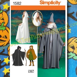 May include: Simplicity sewing pattern number 1582 for four different costumes: a white hooded robe, a gray hooded robe, a black hooded robe, and a brown hooded tunic with a green belt. The pattern is designed by Andrea Schewe.