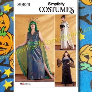May include: Simplicity Costumes sewing pattern number S9629 for three different Halloween costumes. The first costume is a green and iridescent gown with a matching cape and a headpiece. The second costume is a white gown with a slit up the side and a long sleeve. The third costume is a black velvet gown with long sleeves and lace trim.