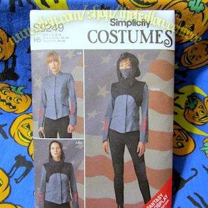 May include: Simplicity Costumes sewing pattern for a jacket and pants. The pattern is for sizes 6-14, 32-40 Euro, and 34-42 French. The pattern shows three different views of the jacket and pants. The jacket has a zipper closure and a hood. The pants are slim-fitting.
