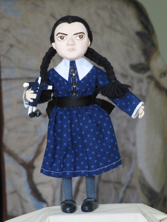 wednesday addams and her doll