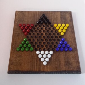 Chinese Checkers Board With Marbles