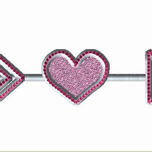 May include: A silver arrow with a pink heart in the center. The arrow has a white outline and the heart has a white outline and a pink glitter texture.