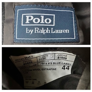 May include: A brown wool suit jacket label with the text "Polo by Ralph Lauren" and the details "GC144 8545 2", "PACCO 80625", "TESSUTO 5547734/09", "FABRIC VIRGIN WOOL EXTRAFINE 100", "CLIENTE 7720", "MODELLO 7B14 92 BLUE-LABEL", "ORDINE 81659", and "44".