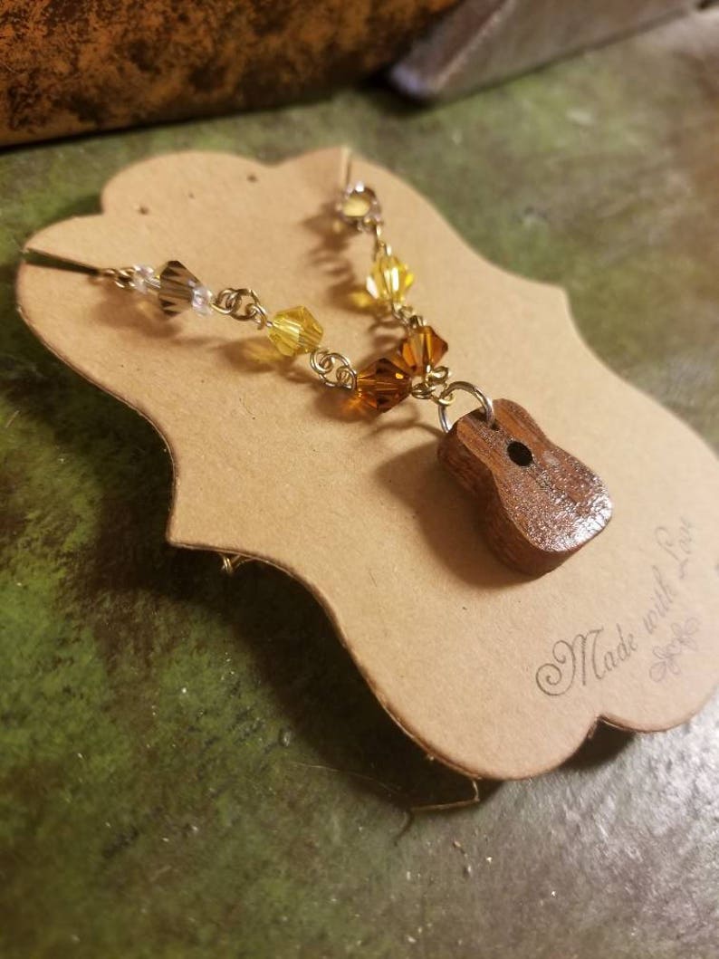 Hand Carved Recycled Mahogany Guitar Necklace