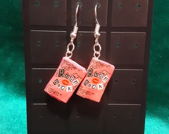 Burn book earrings